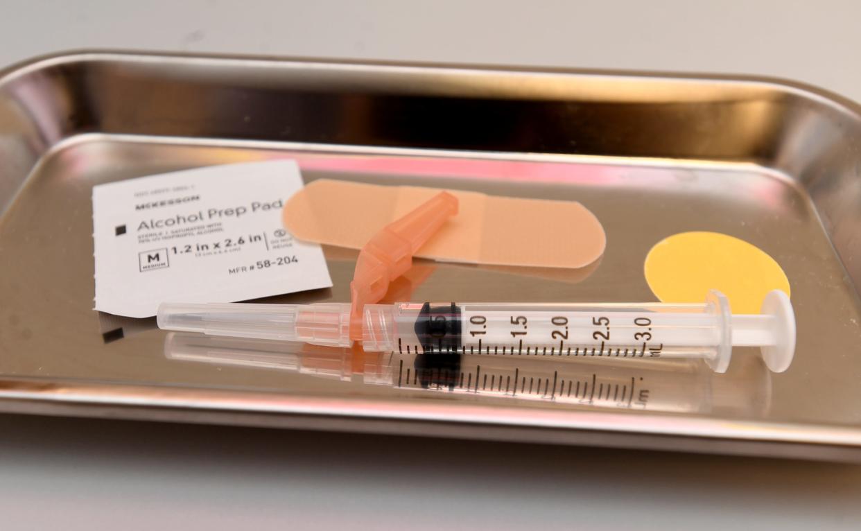 A booster shot sits ready at the Massillon Health Department in northeast Ohio during a Covid-10 vaccine booster clinic. (Julie Vennitti Botos/The Repository)