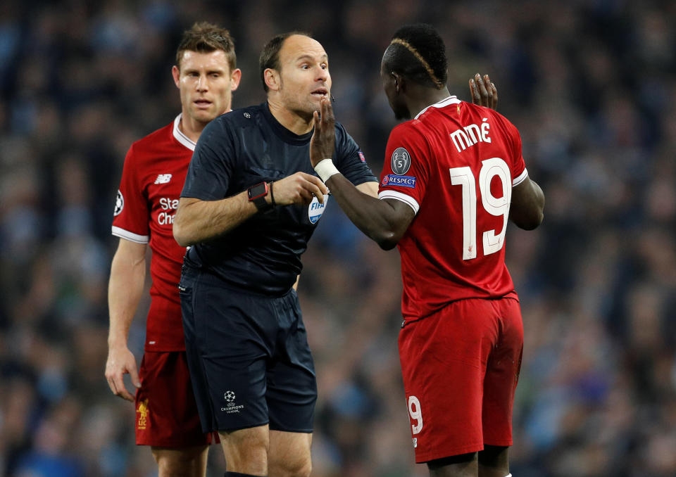 <p>Soccer Football – Champions League Quarter Final Second Leg – Manchester City vs Liverpool – Etihad Stadium, Manchester, Britain – April 10, 2018 Liverpool’s Sadio Mane speaks with referee Antonio Miguel Mateu Lahoz before being booked REUTERS/Darren Staples </p>