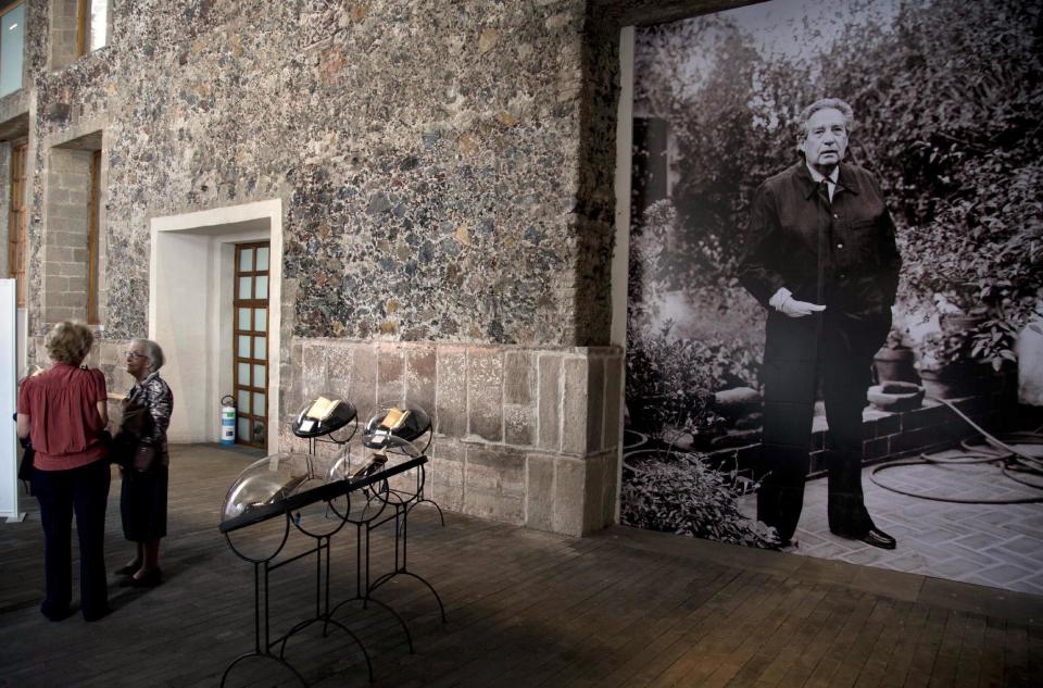 A photo of Mexican Nobel Prize poet and essayist Octavio Paz covers a wall at an exhibit marking the 100th anniversary of his birth in Mexico City, Monday, March 31, 2014. Mexico's government and top poets are holding readings and exhibitions to remember Paz, whose most famous work was the 1950 essay "The Labyrinth of Solitude." Paz died 16 years ago. (AP Photo/Eduardo Verdugo)