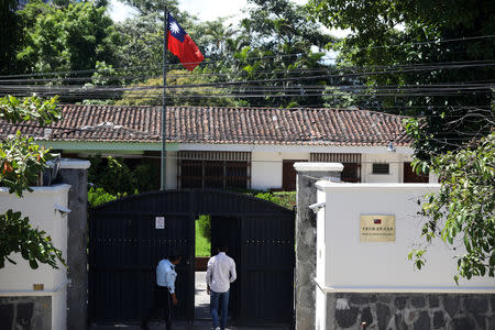 A man walks in the Taiwan embassy a day after the Salvadoran government announced that it has broken off diplomatic relations with Taiwan, in San Salvador, El Salvador August 21, 2018. REUTERS/Jose Cabezas