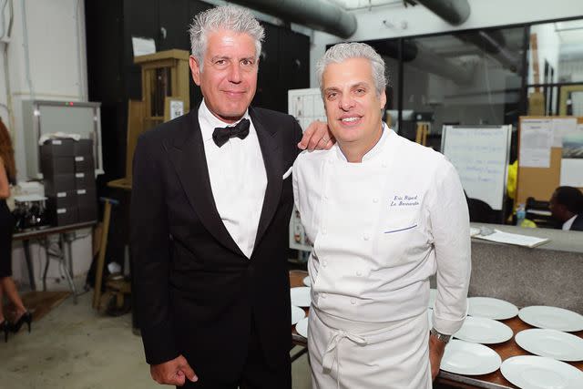 <p>Neilson Barnard/Getty</p> Chefs Anthony Bourdain (L) and Eric Ripert attend Ocean Liner dinner