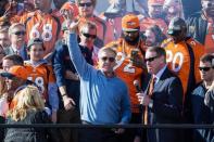 Feb 9, 2016; Denver, CO, USA; Denver Broncos general manager John Elway greets the crowd during the Super Bowl 50 championship parade celebration at Civic Center Park. Mandatory Credit: Isaiah J. Downing-USA TODAY Sports