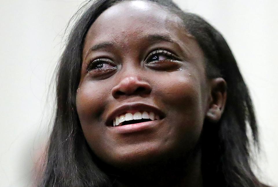 Senior India Wray, who plays Sandy Cheeks, cries tears of laughter at "The SpongeBob Musical" rehearsal at Firestone CLC in Akron Feb. 29.