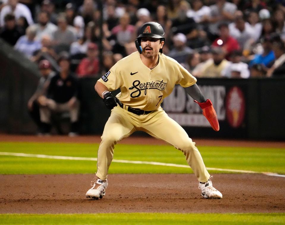 Arizona Diamondbacks Corbin Carroll (7) leads off first base against the Houston Astros in the first inning at Chase Field in Phoenix on Sept. 29, 2023.