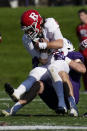 Rutgers quarterback Noah Vedral is sacked by Northwestern linebacker Bryce Gallagher during the first half of an NCAA college football game in Evanston, Ill., Saturday, Oct. 16, 2021. (AP Photo/Nam Y. Huh)