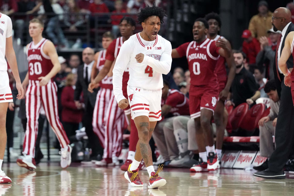 Jan 19, 2024; Madison, Wisconsin, USA; Wisconsin Badgers guard Kamari McGee (4) celebrates a Wisconsin Badgers basket against the Indiana Hoosiers during the second half at the Kohl Center. Mandatory Credit: Kayla Wolf-USA TODAY Sports