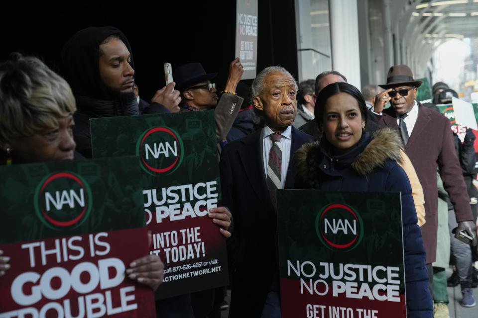 Rev. Al Sharpton walks a picket line with protesters outside the office of hedge fund billionaire Bill Ackman, who has donated millions to Harvard, to protest his campaign against diversity, equity, and inclusion Thursday, Jan. 4, 2024, in New York. Harvard University President Claudine Gay resigned Tuesday amid plagiarism accusations and criticism over testimony at a congressional hearing where she was unable to say unequivocally that calls on campus for the genocide of Jews would violate the school's conduct policy. (AP Photo/Frank Franklin II)