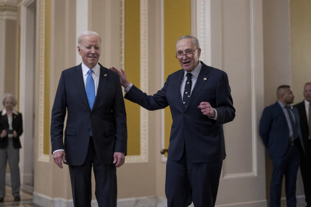 FILE - President Joe Biden, left, and Senate Majority Leader Chuck Schumer, D-N.Y., talk to reporters after a lunch with Senate Democrats at the Capitol in Washington, March 2, 2023. House Republicans are set to approve a sprawling energy package that counters virtually all of President Joe Biden's agenda to address climate change.(AP Photo/J. Scott Applewhite, Filemon Vela, D-Texas,)