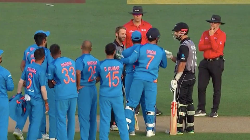 Daryl Mitchell and Kane Williamson argued with India over the decision. Pic: Fox Sports