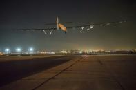 This handout photo, courtesy of Solar Impulse, shows Solar Impulse 2, the solar powered plane, piloted by Swiss Bertrand Piccard taking off from Cairo's International Airport in Egypt on July 24, 2016