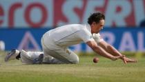 Cricket - India v Australia - Fourth Test cricket match - Himachal Pradesh Cricket Association Stadium, Dharamsala, India - 28/03/17 - Australia's Steeve O'Keefe dives to stop the ball. REUTERS/Adnan Abidi