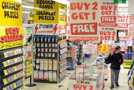 A customer browses an electrical goods retail store in Sydney. Consumer spending was the main driver of quarterly growth, contributing 0.6 percentage points to gross domestic product