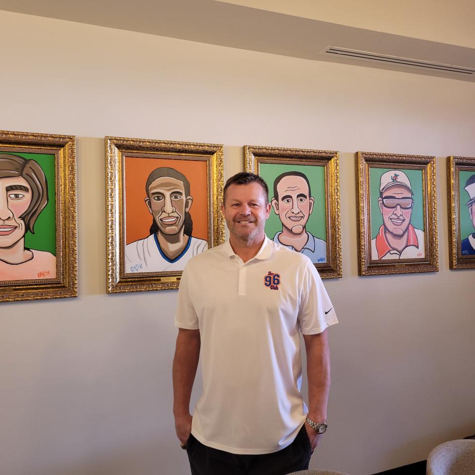 Formrer Florida football player James Bates has painted portraits of 19 championship-winning coaches at UF for Steve Spurrier's restaurant.