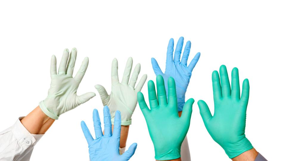 Surgical gloves can be useful while touching and disinfecting contaminated surfaces.