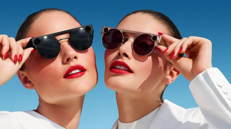 Two models wear different styles of Snap’s Spectacles 3 smart glasses.