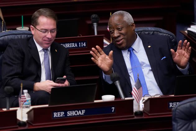 Florida Representatives Webster Barnaby (right) and Jason Shoaf (left) chat during a break in a legislative session on April 30, 2021. 