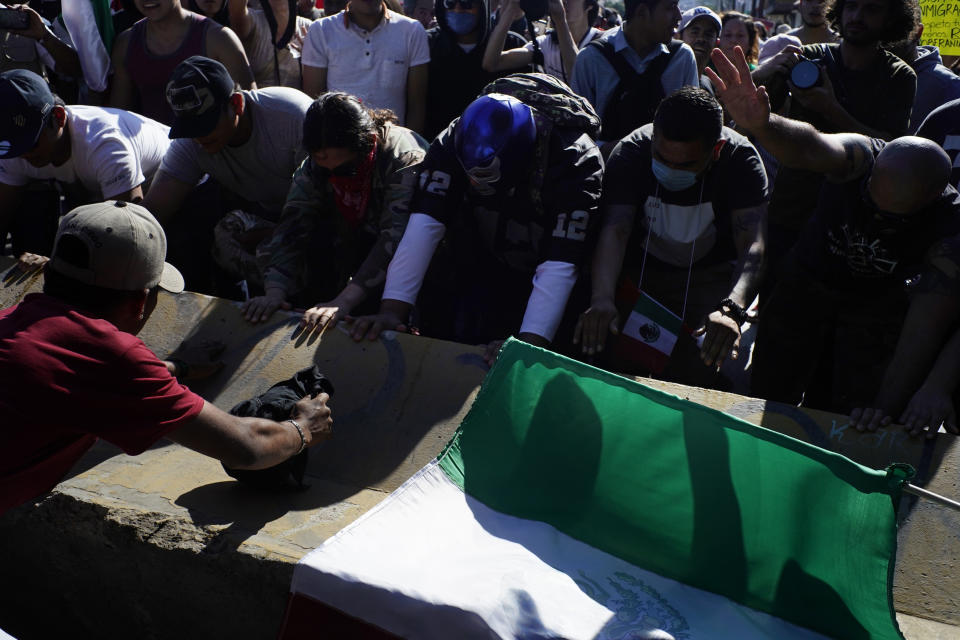 Protesters in Tijuana chant ‘Out!’ at Central American migrants