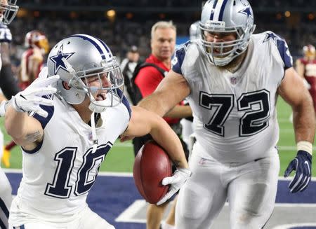 FILE PHOTO: Nov 30, 2017; Arlington, TX, USA; Dallas Cowboys receiver Ryan Switzer (10) celebrates his touchdown in the second quarter with center Travis Frederick (72) against the Washington Redskins at AT&T Stadium. Mandatory Credit: Matthew Emmons-USA TODAY Sports/File Photo