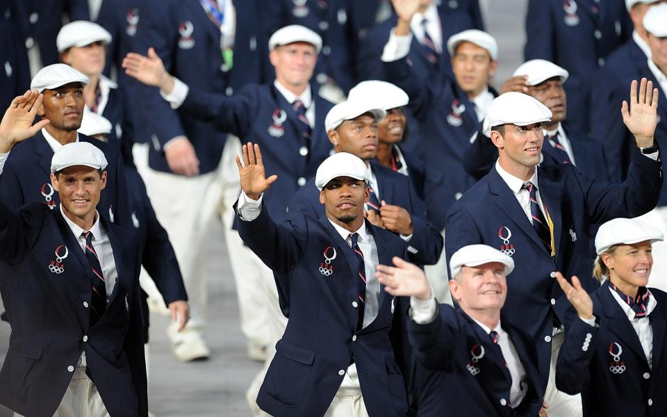 <p>In 2008, Team USA looked sporty and classic with navy blazers and white caps. (Getty) </p>