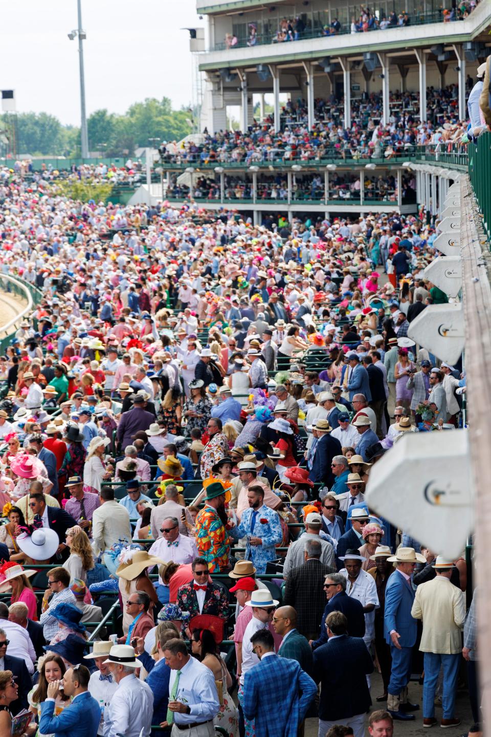 Crowds enjoy the races at the 149th Kentucky Derby at Churchill Downs, Saturday, May 6, 2023.