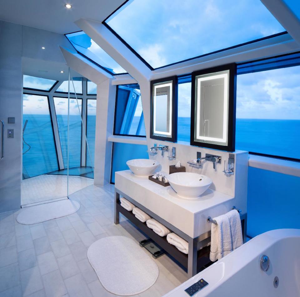 This undated photo provided by Celebrity Cruises shows the Reflection Suite bathroom on Celebrity’s new Reflection ship. The all-glass shower extends over the edge of the ship with a wraparound verandah and special glass so you can see out, but not in. It’s one of a number of new features and attractions on ships as the 2013 cruise season gets under way. (AP Photo/Celebrity Cruises)