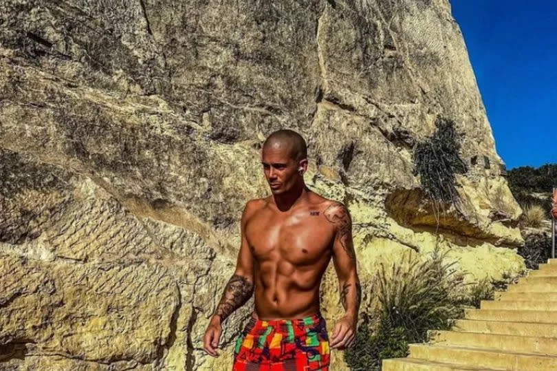 Max was seen soaking up the sun -Credit:Max George Instagram