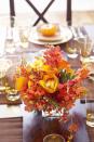 <p>When in doubt, lean on flowers in autumnal hues. Incorporate berry branches to make even more of a statement.</p>