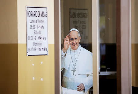 An image of Pope Francis is seen at Caacupe church in Caacupe, outside of Asuncion, Paraguay, July 11, 2015. REUTERS/Alessandro Bianchi