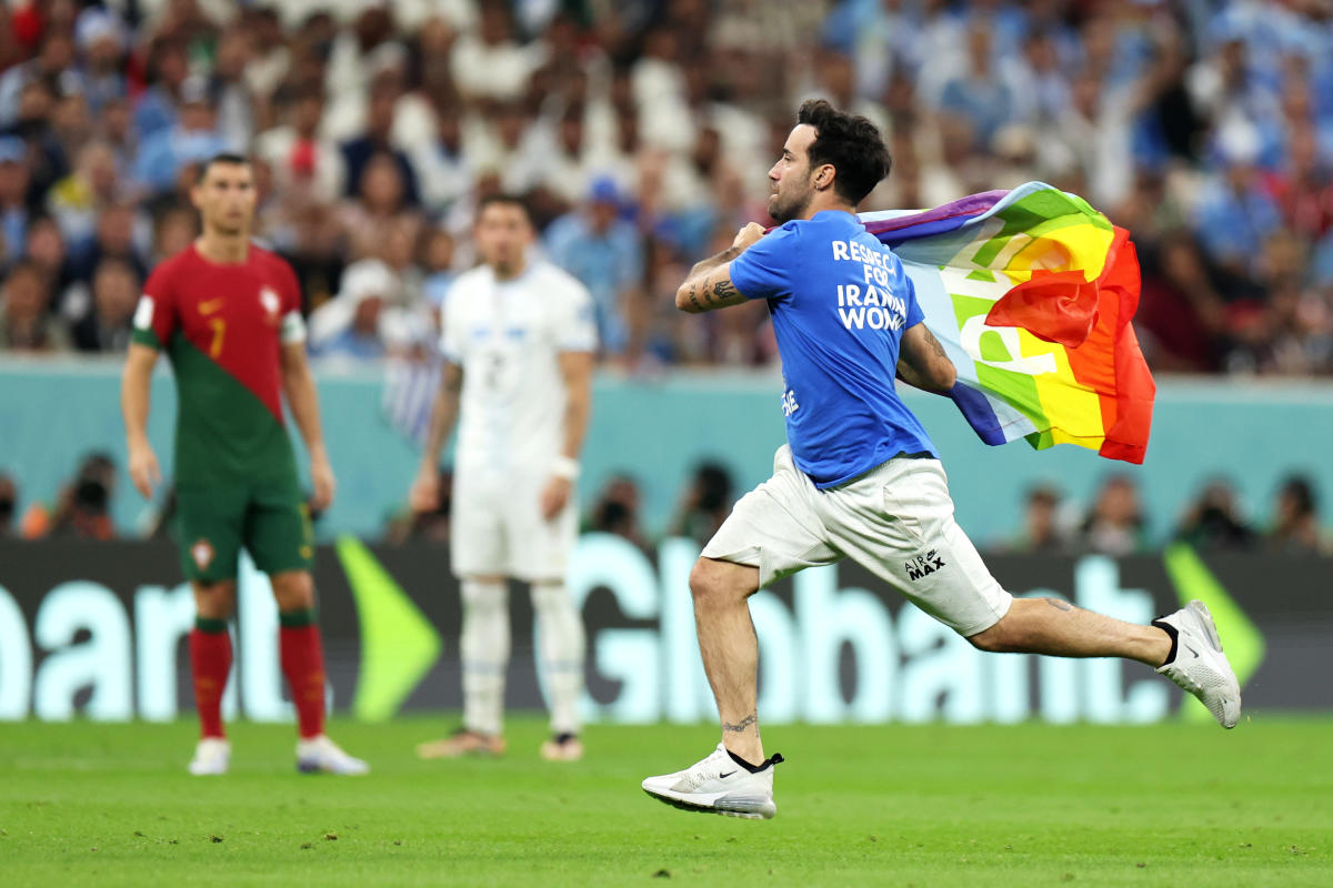 Rainbow flag-waving protester invades pitch during Portugal-Uruguay match