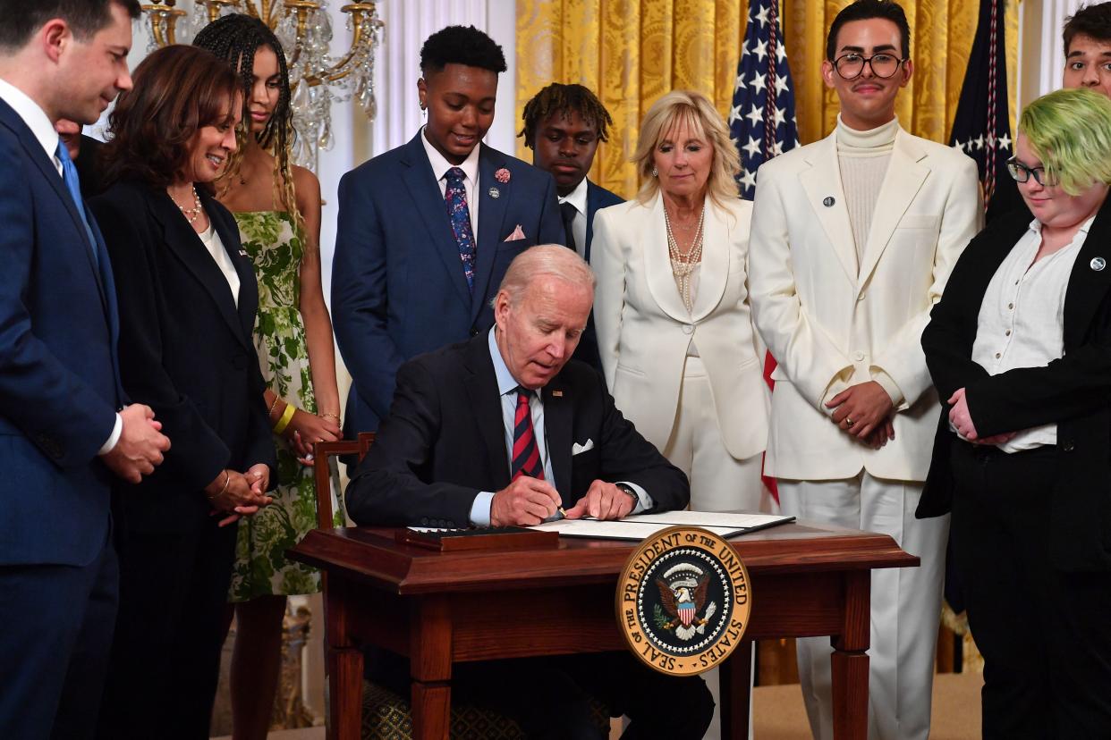 On Wednesday, President Joe Biden signed an executive order to help queer people living in states that have targeted them.  (Nicholas Kamm/AFP via Getty Images)