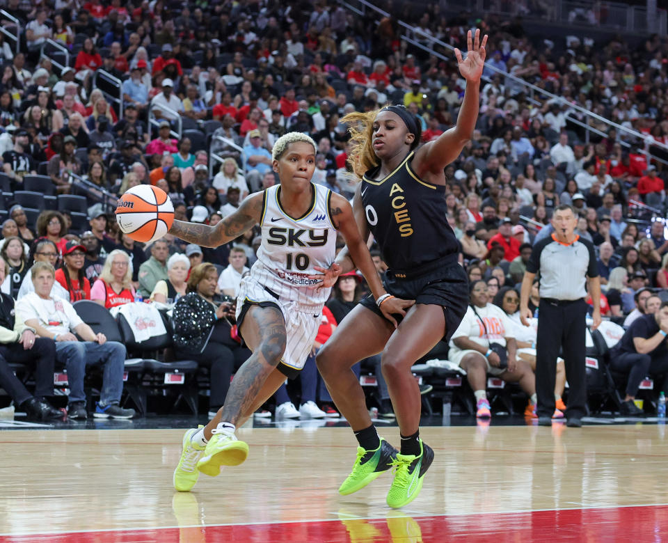 Chicago Sky guard Courtney Williams drives against Las Vegas Aces guard Jackie Young in Game 1 of the first round of the 2023 WNBA Playoffs at T-Mobile Arena in Las Vegas on Sept. 13, 2023. (Ethan Miller/Getty Images)
