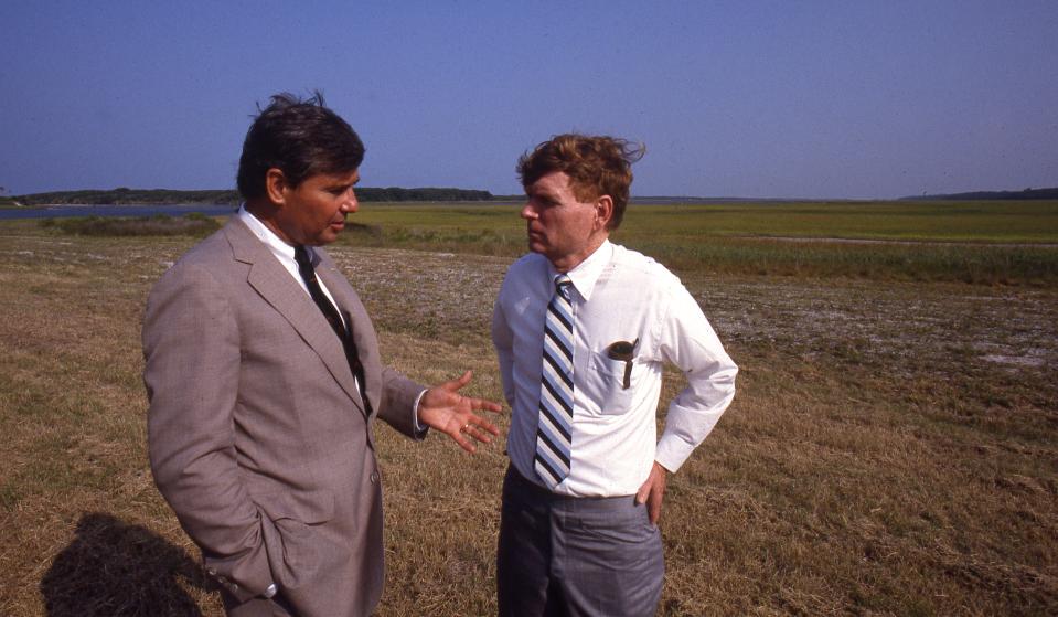 Then-Florida Gov. Bob Graham speaks with Herb Peyton, president of Gate Petroleum Company, about the transfer of Guana Lake to the state.
