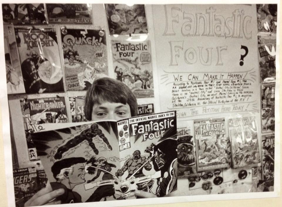 Joe Field poses with a Fantastic Four comic while promoting the petition drive at Al's Comics in Stockton in 1985.