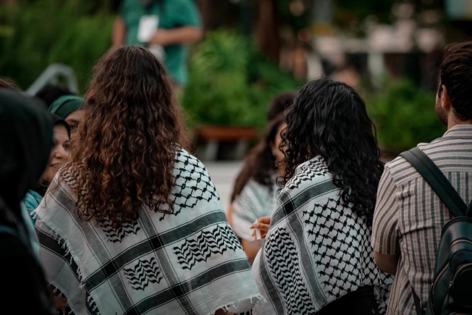 Attendees at a vigil on the University of Miami’s campus to honor the lives lost in the Israel-Hamas war.