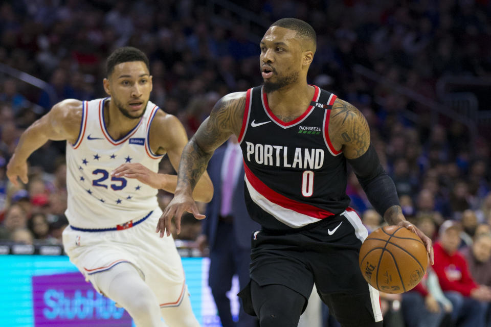 Portland's Damian Lillard is reportedly excited about the prospect of playing with three-time All-Star Ben Simmons. (Mitchell Leff/Getty Images)