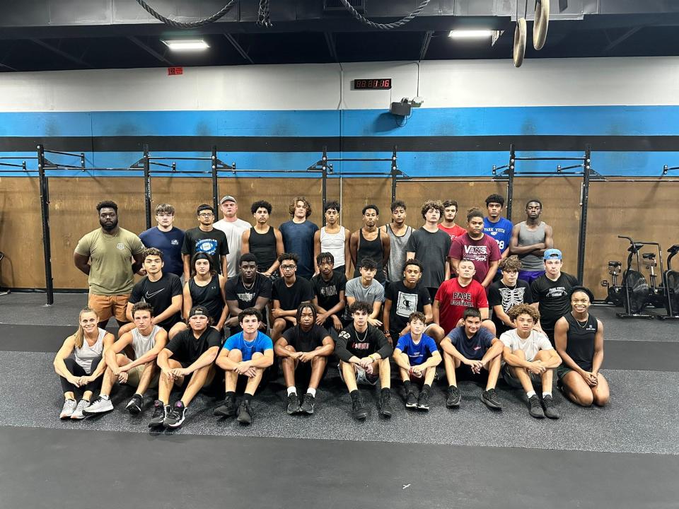 Dr. Joaquín García’s football team trained at CrossFit561 in Lake Worth while waiting for the school’s weight room to be finished over the summer.