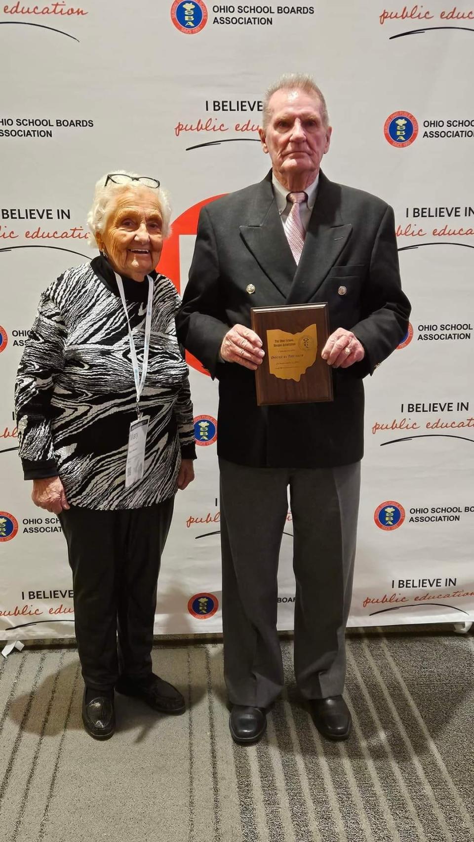 Doug Theaker and his wife Mary Jean, also a long-time school board member, following the award presentation at the OSBA Capital Conference.