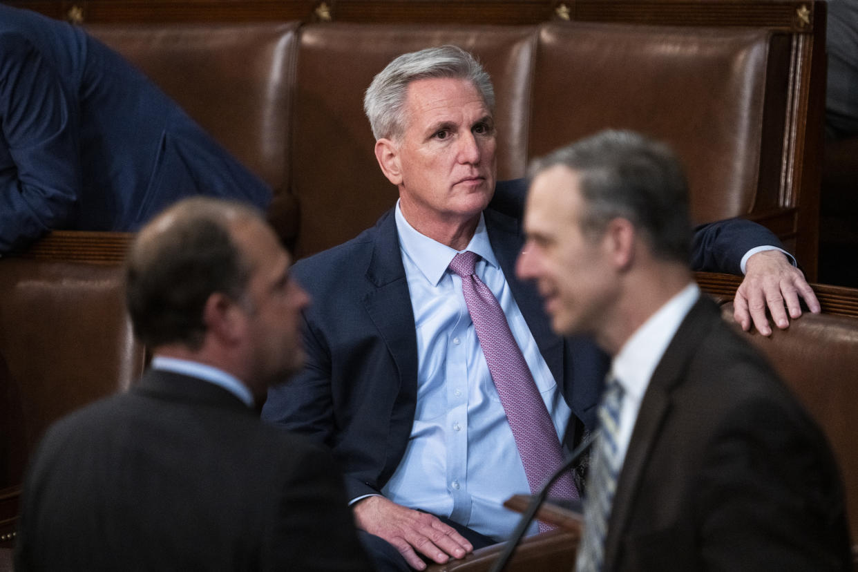 UNITED STATES - JANUARY 6: Republican Leader Kevin McCarthy, R-Calif., Reps. Scott Perry, R-Pa., right, and Andy Barr, R-Ky., are seen on the House floor after a vote in which he did not receive enough votes for Speaker of House on Friday, January 6, 2023. The House will resume voting at 10pm. (Tom Williams/CQ-Roll Call, Inc via Getty Images)