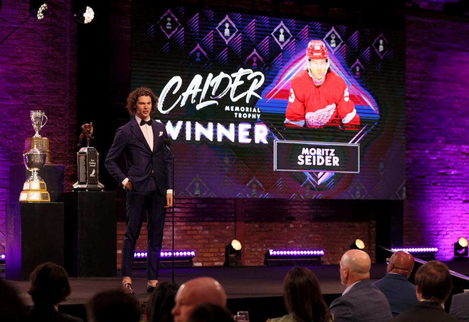 Moritz Seider of the Detroit Red Wings speaks after being awarded the Calder Trophy for outstanding rookie during the 2022 NHL Awards at Armature Works on June 21, 2022 in Tampa, Florida.
