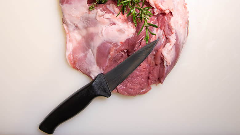 boning knife with meat