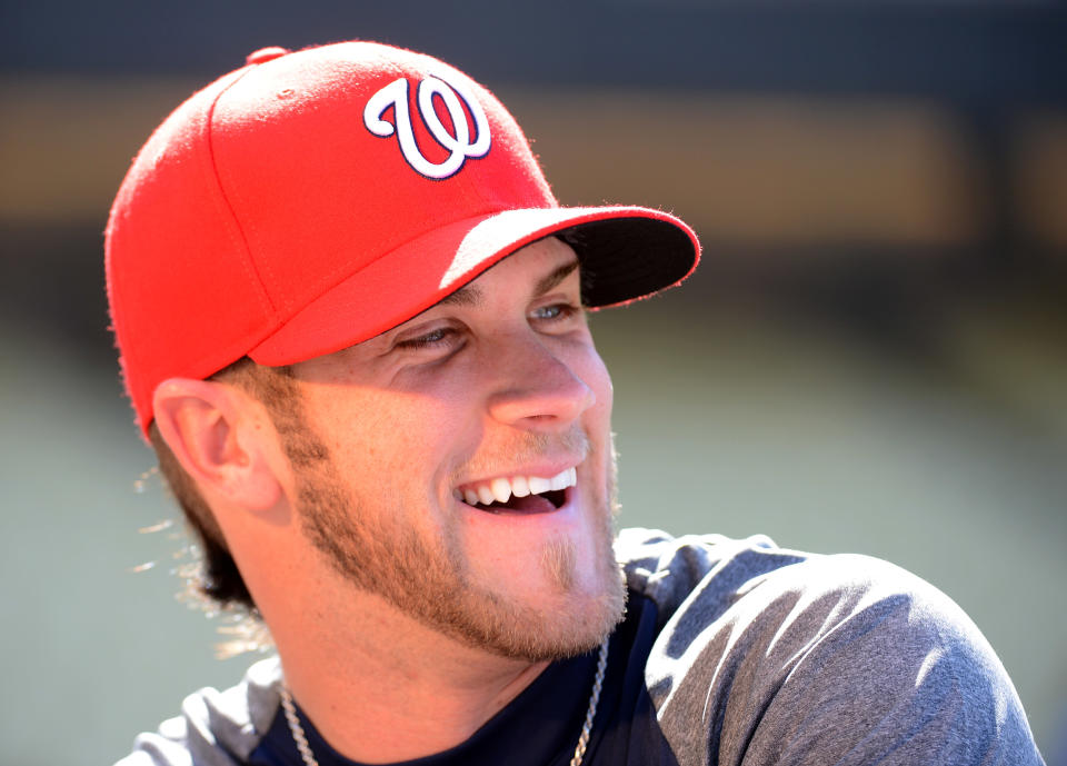 LOS ANGELES, CA - APRIL 28: Bryce Harper #34 of the Washington Nationals speaks to the media in his major league debut during practice before the game against the Los Angeles Dodgers at Dodger Stadium on April 28, 2012 in Los Angeles, California. (Photo by Harry How/Getty Images)