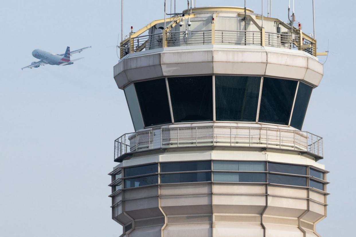 Control towers at airports are only the most visible parts of the complex national air traffic control system. <a href="https://www.gettyimages.com/detail/news-photo/an-american-airlines-airbus-a319-airplane-takes-off-past-news-photo/1246152990" rel="nofollow noopener" target="_blank" data-ylk="slk:Saul Loeb/AFP via Getty Images;elm:context_link;itc:0;sec:content-canvas" class="link ">Saul Loeb/AFP via Getty Images</a>