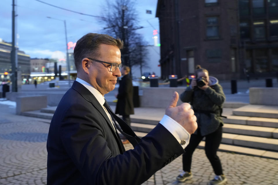Chairman of the National Coalition Party Petteri Orpo arrives to the Parliament House during parliamentary election in Helsinki, Finland, Sunday, April 2, 2023. (AP Photo/Sergei Grits)