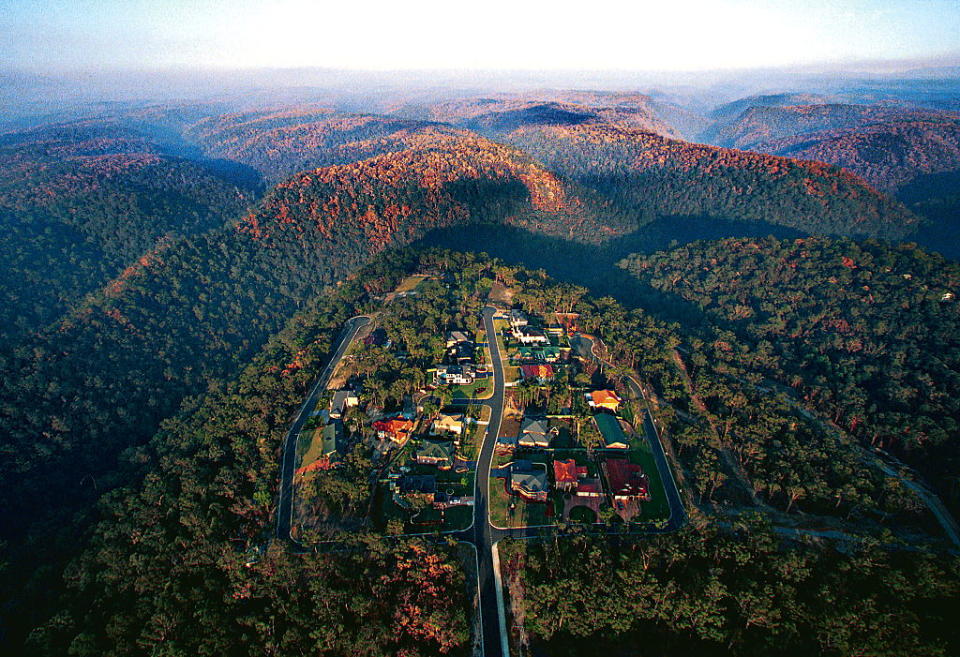 An aerial view of the Blaxland area affected by bushfires, 13 January 2002.