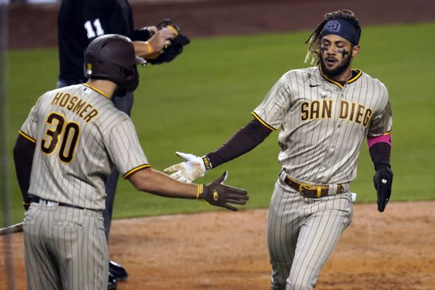 Dodgers top M's in extras, secure NL West title