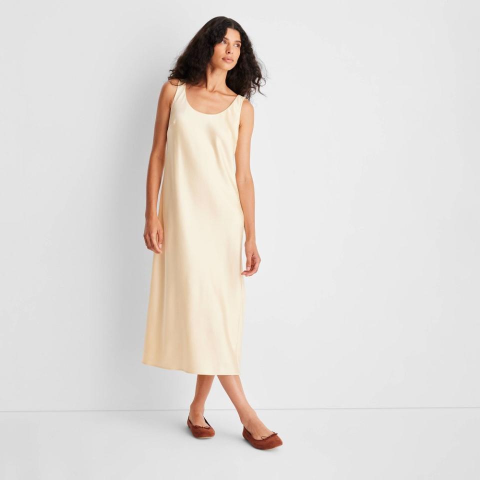 <p><a href="https://www.target.com/p/women-39-s-scoop-neck-strappy-midi-slip-dress-future-collective-8482-with-reese-blutstein-yellow-m/-/A-88188406" rel="nofollow noopener" target="_blank" data-ylk="slk:Shop Now;elm:context_link;itc:0;sec:content-canvas" class="link ">Shop Now</a></p><p>Scoop Neck Dress </p><p>target.com</p><p>$34.00</p><span class="copyright">Future Collective with Reese Blutstein</span>