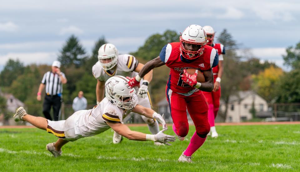 Plainfield’s Eatoniel Brown (13) runs the ball against Watchung Hills on Saturday, Oct. 7, 2023, afternoon at Hub Stein Field in Plainfield.