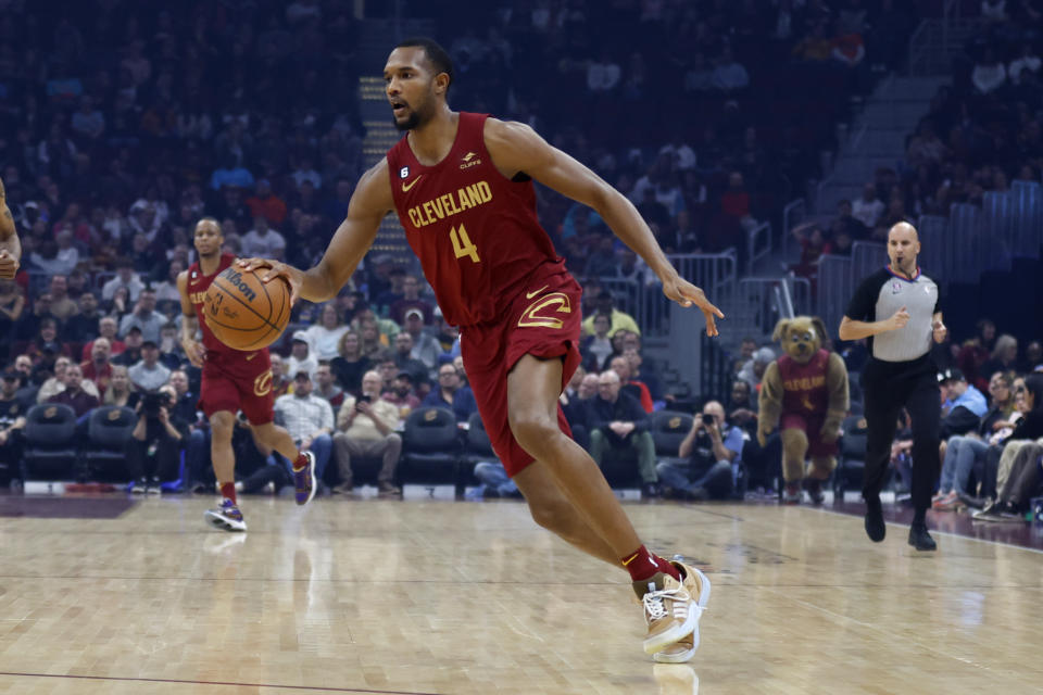 Cleveland Cavaliers forward Evan Mobley plays against the San Antonio Spurs during the first half of an NBA basketball game, Monday, Feb. 13, 2023, in Cleveland. (AP Photo/Ron Schwane)