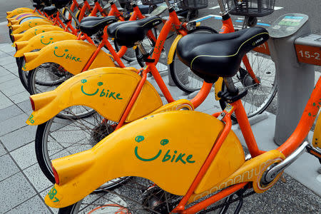 FILE PHOTO: The logo of YouBike, a bicycle sharing system, is seen in a station in Taipei, Taiwan August 31, 2017. REUTERS/Tyrone Siu/File Photo