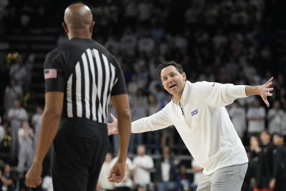 Grand Canyon coach Bryce Drew talks to an official during the first half of the team's NCAA college basketball game against San Diego State, Tuesday, Dec. 5, 2023, in Phoenix. (AP Photo/Rick Scuteri)